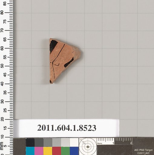 Terracotta fragment of a stemless kylix (drinking cup)