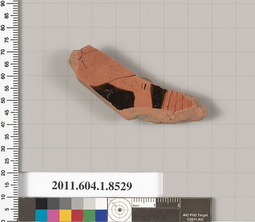 Terracotta fragment of a stemless kylix (drinking cup)