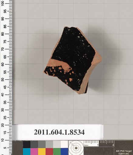 Terracotta fragment of a stemless kylix (drinking cup)