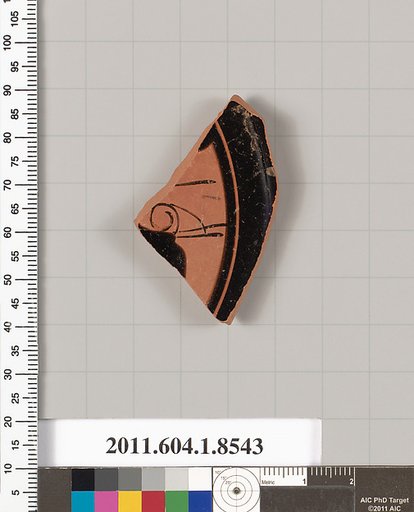 Terracotta fragment of a stemless kylix (drinking cup)