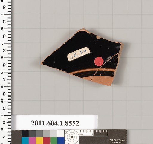 Terracotta fragment of a stemless kylix (drinking cup)