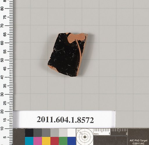 Terracotta fragment of a stemless kylix (drinking cup)
