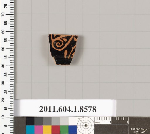 Terracotta fragment of a stemless kylix (drinking cup)