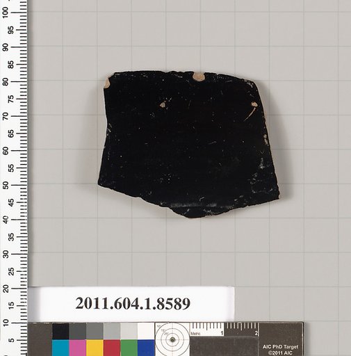 Terracotta fragment of a stemless kylix (drinking cup)
