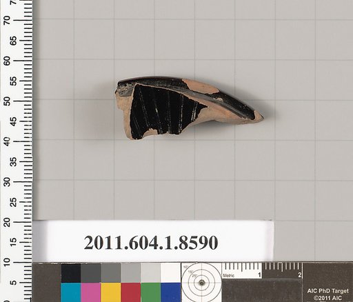 Terracotta fragment of a stemless kylix (drinking cup)