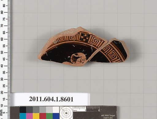 Terracotta fragment of a stemless kylix (drinking cup)