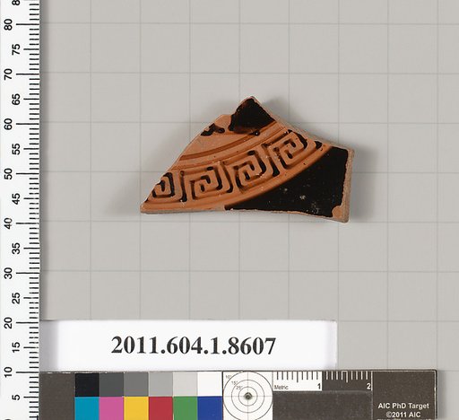 Terracotta fragment of a stemless kylix (drinking cup)