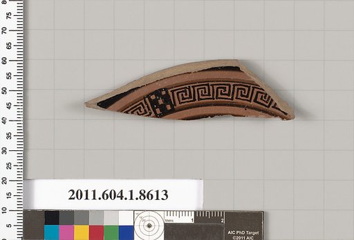 Terracotta fragment of a stemless kylix (drinking cup)