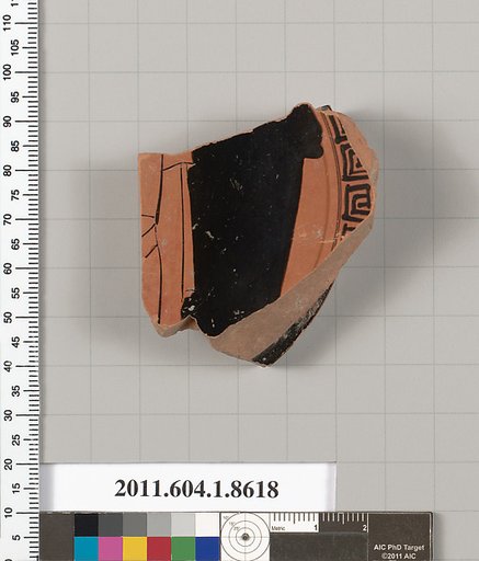 Terracotta fragment of a stemless kylix (drinking cup)