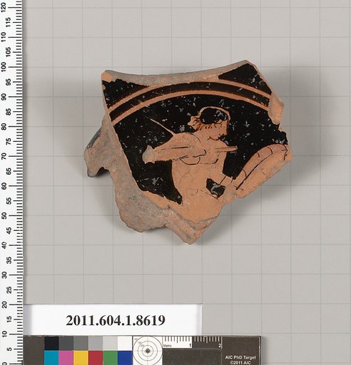Terracotta fragment of a stemless kylix (drinking cup)