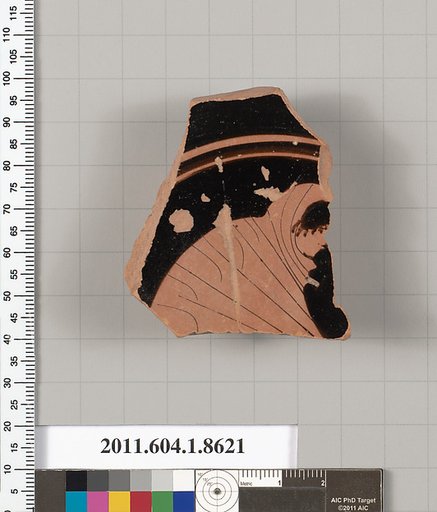 Terracotta fragment of a stemless kylix (drinking cup)