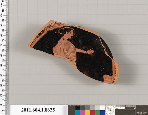 Terracotta fragment of a stemless kylix (drinking cup)