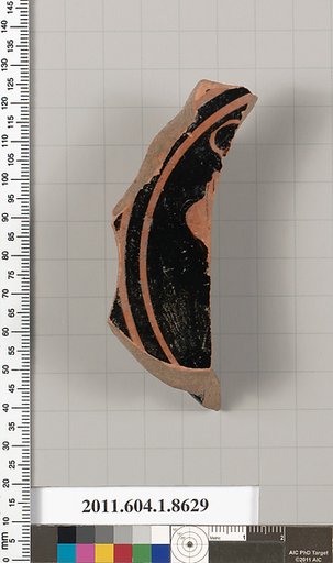 Terracotta fragment of a stemless kylix (drinking cup)