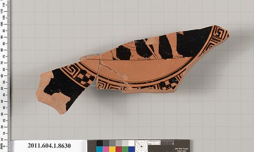 Terracotta fragment of a stemless kylix (drinking cup)