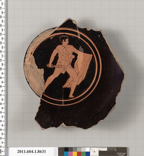Terracotta fragment of a stemless kylix (drinking cup)