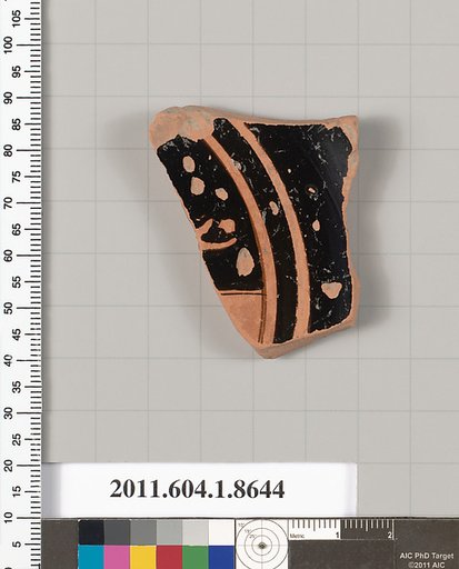 Terracotta fragment of a stemless kylix (drinking cup)