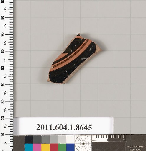 Terracotta fragment of a stemless kylix (drinking cup)