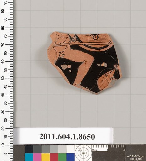 Terracotta fragment of a stemless kylix (drinking cup)