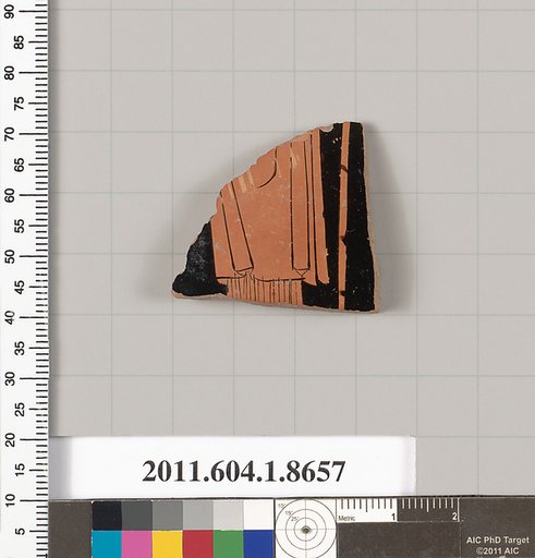 Terracotta fragment of a stemless kylix (drinking cup)