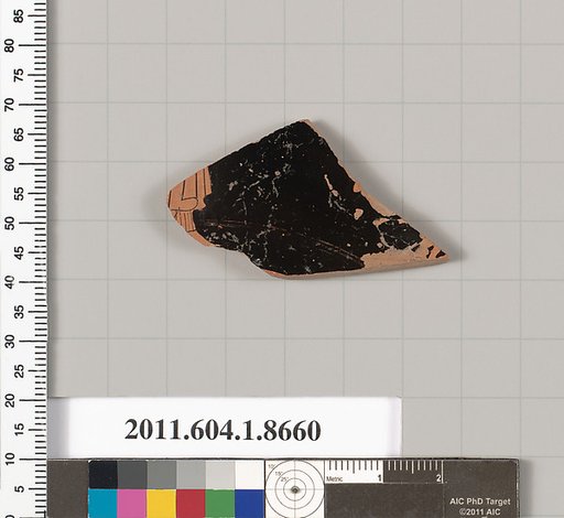 Terracotta fragment of a stemless kylix (drinking cup)