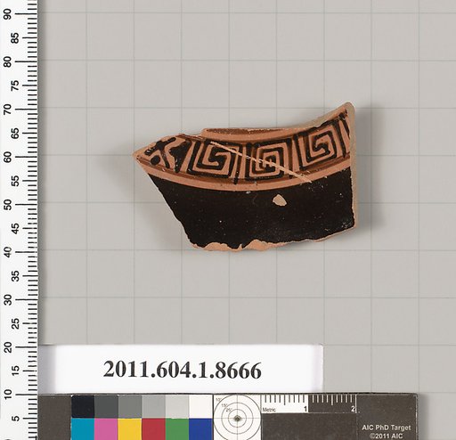 Terracotta fragment of a stemless kylix (drinking cup)