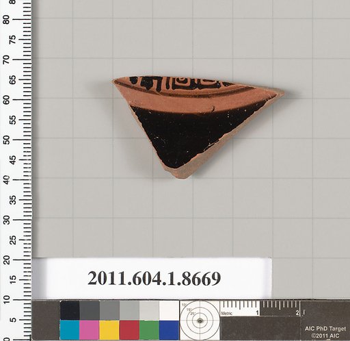 Terracotta fragment of a stemless kylix (drinking cup)