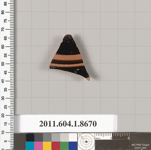 Terracotta fragment of a stemless kylix (drinking cup)