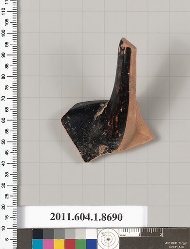 Terracotta fragment of a stemless kylix (drinking cup)