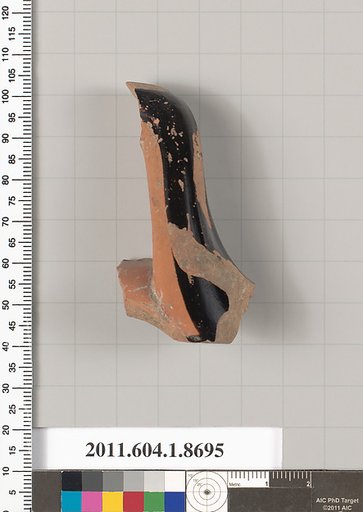 Terracotta fragment of a stemless kylix (drinking cup)