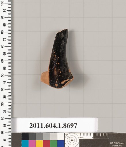 Terracotta fragment of a stemless kylix (drinking cup)