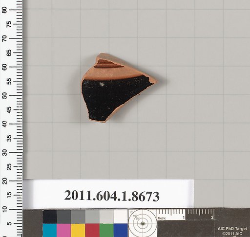 Terracotta fragment of a stemless kylix (drinking cup)