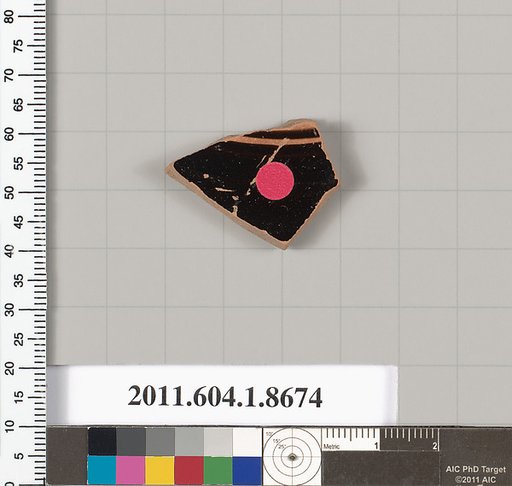Terracotta fragment of a stemless kylix (drinking cup)