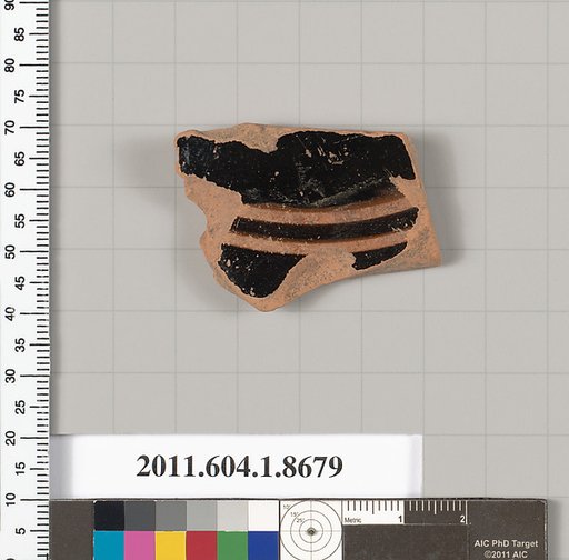 Terracotta fragment of a stemless kylix (drinking cup)