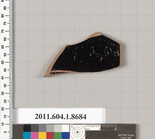 Terracotta fragment of a stemless kylix (drinking cup)