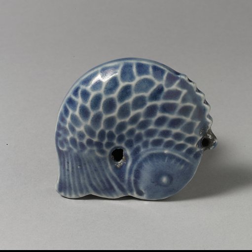 Water dropper in the shape of a fish