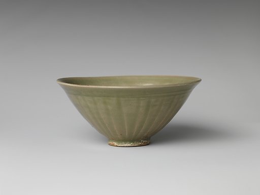 Bowl with Decoration of Boys in Waves