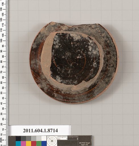 Terracotta fragment of a kylix (drinking cup)