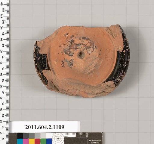 Terracotta fragment of a standlet