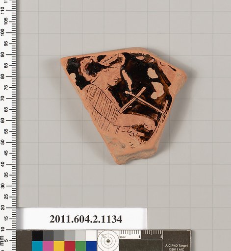 Terracotta fragment of a lekanis lid (covered dish)