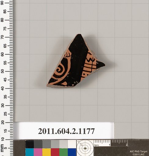 Terracotta fragment of a lekanis lid (covered dish)