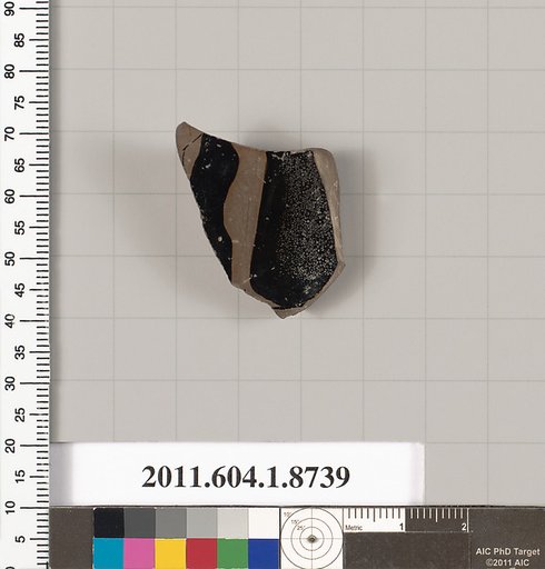 Terracotta fragment of a stemless cup