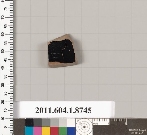 Terracotta fragment of a stemless cup