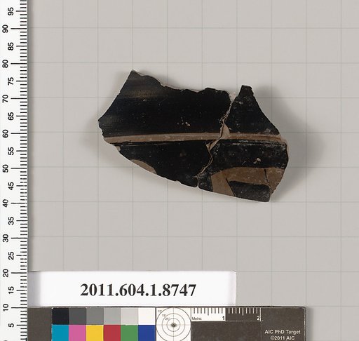Terracotta fragment of a kylix (drinking cup)