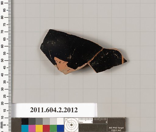Terracotta fragment of an oinochoe: chous (jug)?