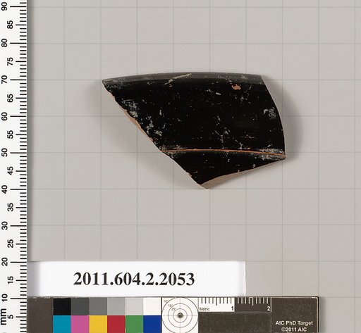 Terracotta fragment of a lid?