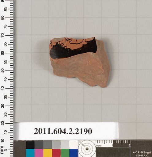 Terracotta fragment of a pot; unglazed on the inside