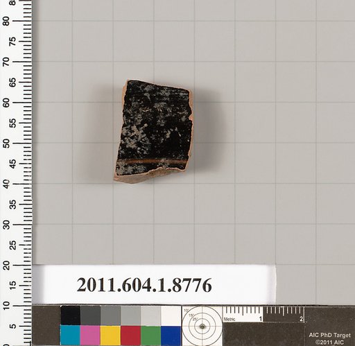 Terracotta fragment of a stemless kylix (drinking cup)?