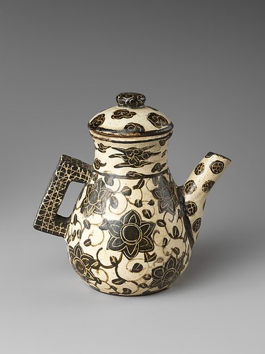 Spouted pouring vessel