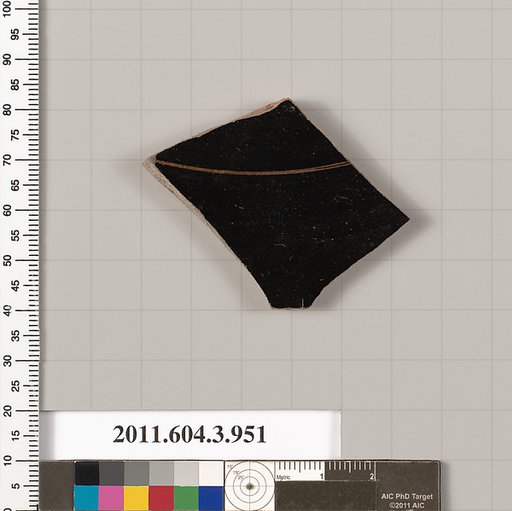 Terracotta fragment of a lekanis lid (covered dish)