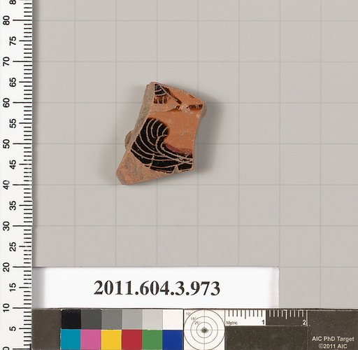 Terracotta fragment of a lekanis lid (covered dish)